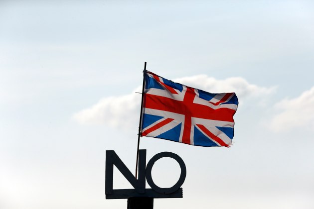 File photo of a "No" campaign placard and Union flag seen outside a cottage on the Isle of North Uist, in the Outer Hebrides of Scotland
