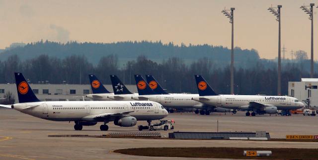 Planes of German flagship carrier Lufthansa are parked on tarmac at Munich's airport