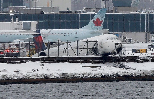 Delta flight 1086 is seen after it slid off the runway upon landing at New York's LaGuardia Airport