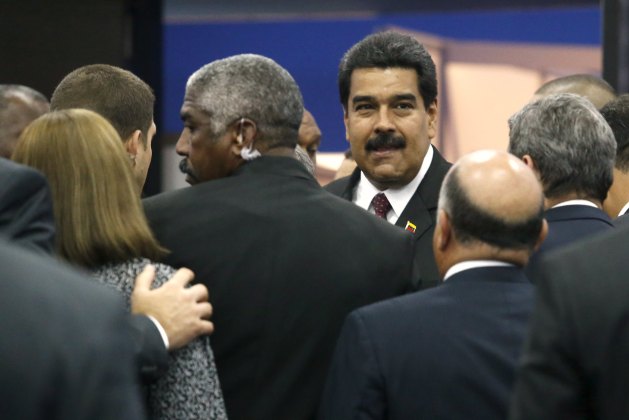 Maduro departs after a group photo during the first plenary session of the Summit of the Americas in Panama City, Panama