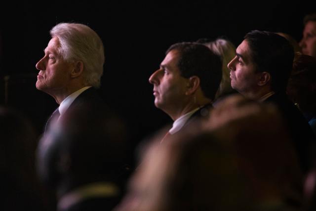 Former U.S. President Clinton listens to speakers during "Not There Yet: A Data Driven Analysis of Gender Equality" in New York