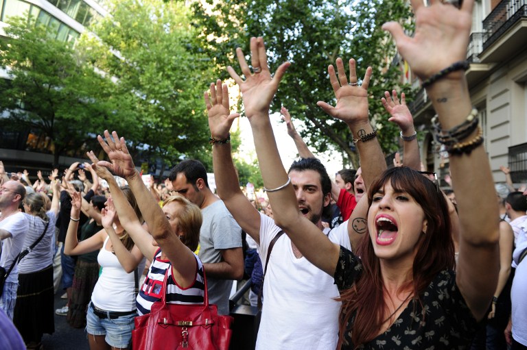 Manifestantes en Madrid exigen renuncia de Rajoy