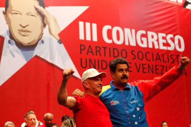 Venezuela's president Maduro embraces retired General Carvajal as they attend the Socialist party congress in Caracas