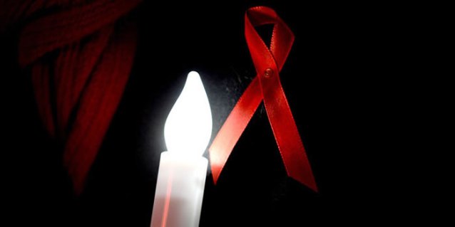 lazo-rojo-vela-contra-el-sida