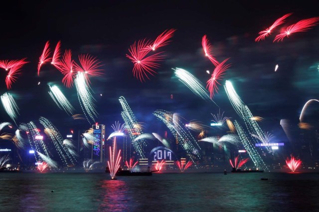 Fireworks explode as "2017" is displayed at the Hong Kong Convention and Exhibition Centre during New Year celebrations in Hong Kong, China January 1, 2017. REUTERS/Bobby Yip