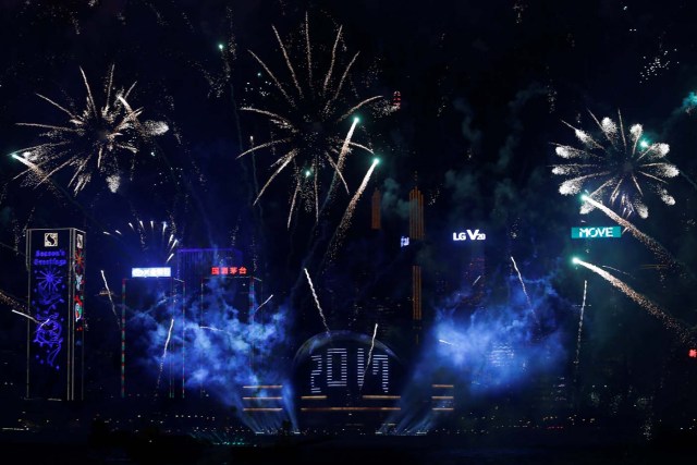 Fireworks explode as "2017" is displayed at the Hong Kong Convention and Exhibition Centre during New Year's celebrations in Hong Kong, China January 1, 2017. REUTERS/Bobby Yip