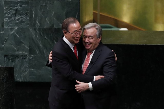United Nations Secretary-General Ban Ki-moon (L) embraces Secretary-General-designate Mr. Antonio Guterres after his swearing-in at UN headquarters in New York, U.S., December 12, 2016. REUTERS/Lucas Jackson