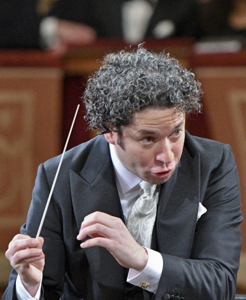 Venezulean conductor Gustavo Dudamel conducts the traditional New Year's Concert 2017 with the Vienna Philharmonic Orchestra at the Vienna Musikverein in Vienna, Austria, on January 1, 2017. / AFP PHOTO / APA / HERBERT NEUBAUER / Austria OUT
