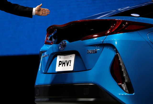 Toyota Motor Corp. presents the company's Prius PHV Plug-in-Hybrid vehicle, also known as Prius Prime in the U.S., during an event to mark the launch of the car in Japan, in Tokyo, Japan February 15, 2017. REUTERS/Issei Kato