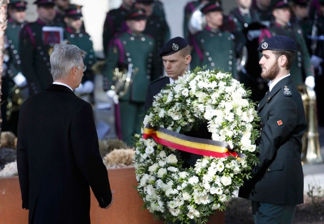 Belgium's King Philippe lays a wreath during a ceremony in Brussels to commemorate the first anniversary of twin attacks at Brussels airport and a metro train in Brussels, Belgium, March 22, 2017. REUTERS/Yves Herman
