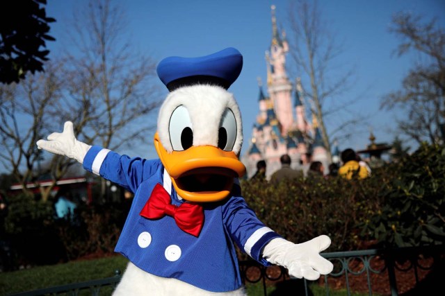 Disney character Donald Duck poses for photos in Disneyland Paris ahead of the 25th anniversary of the park in Marne-la-Vallee, near Paris, France, March 16, 2017. Picture taken March 16, 2017. REUTERS/Benoit Tessier