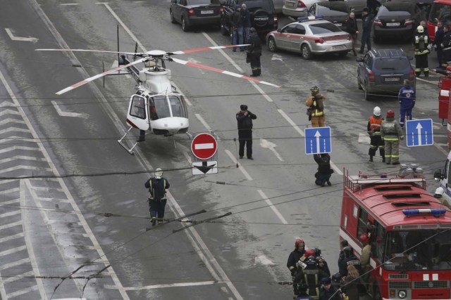 General view of emergency services attending the scene outside Sennaya Ploshchad metro station, following explosions in two train carriages in St. Petersburg, Russia, April 3, 2017. REUTERS/Anton Vaganov