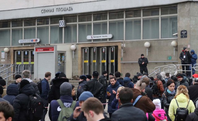 People gather outside Sennaya Ploshchad metro station after an explosion tore through a train carriage in the St. Petersburg metro system, in St. Petersburg, Russia April 3, 2017. REUTERS/Igor Russak FOR EDITORIAL USE ONLY. NO RESALES. NO ARCHIVES.