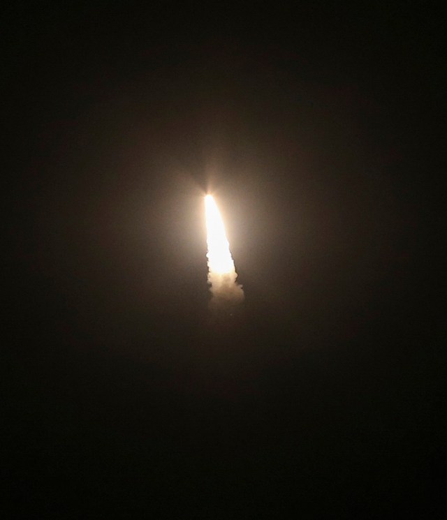 The US military test fires an unarmed intercontinental ballistic missile (ICBM) at Vandenberg Air Force Base, some 130 miles (209 kms) northwest of Los Angeles, California early on May 3, 2017. / AFP PHOTO / RINGO CHIU