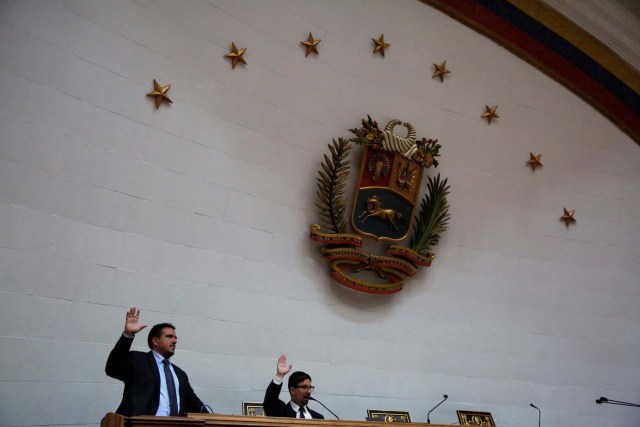 First Vice-President of the National Assembly Freddy Guevara and lawmaker Stalin Gonzalez participate in a session of the Assembly in Caracas, Venezuela, August 15, 2017. REUTERS/Carlos Garcia Rawlins