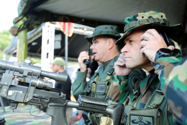 Admiral-in-Chief Remigio Ceballos, Strategic Operational Commander of the Bolivarian National Armed Forces attends snipers drills next to Venezuela's Defense Minister Vladimir Padrino Lopez, during military exercises in Caracas, Venezuela August 26, 2017. Miraflores Palace/Handout via REUTERS ATTENTION EDITORS - THIS PICTURE WAS PROVIDED BY A THIRD PARTY.