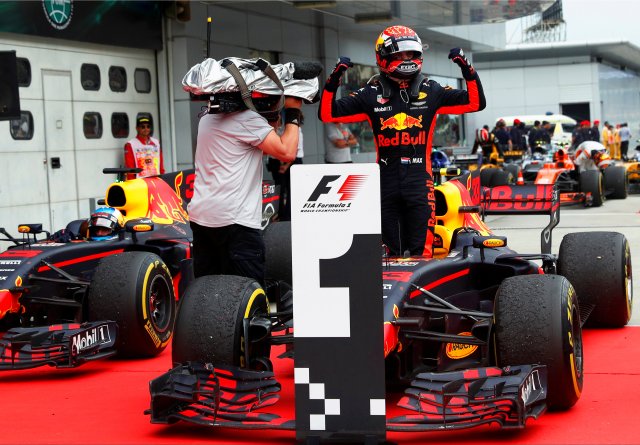 Formula One F1 - Malaysia Grand Prix - Sepang, Malaysia - October 1, 2017. Redbull's Max Verstappen celebrates winning the race. REUTERS/Edgar Su TPX IMAGES OF THE DAY TPX IMAGES OF THE DAY