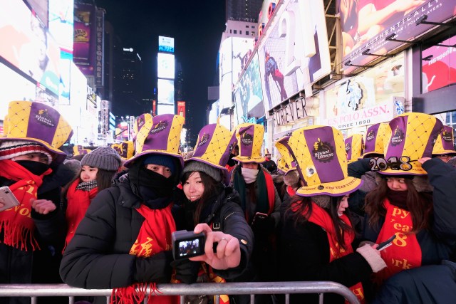 NEW YORK, NY - DECEMBER 31: A general view of atmosphere during New Year's Eve 2018 in Times Square on December 31, 2017 in New York City. Dimitrios Kambouris/Getty Images/AFP