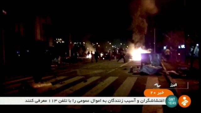 REFILE - ADDITIONAL USAGE RESTRICTIONS   Protesters are seen on street  in Tuyserkan, Iran, in this still image taken from video on December 31, 2017. IRINN/ReutersTV via REUTERS ATTENTION EDITORS - THIS IMAGE WAS PROVIDED BY A THIRD PARTY. IRAN OUT. NO RESALES. NO ARCHIVE. NO ACCESS BBC PERSIAN, NO ACCESS MANOTO, NO ACCESS VOA PERSIAN.