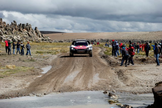 Dakar Rally - 2018 Peru-Bolivia-Argentina Dakar rally - 40th Dakar Edition stage six, Arequipa to La Paz - January 11, 2018. Carlos Sainz of Spain and co-pilot Lucas Cruz of Spain drive their Peugeot. REUTERS/Andres Stapff