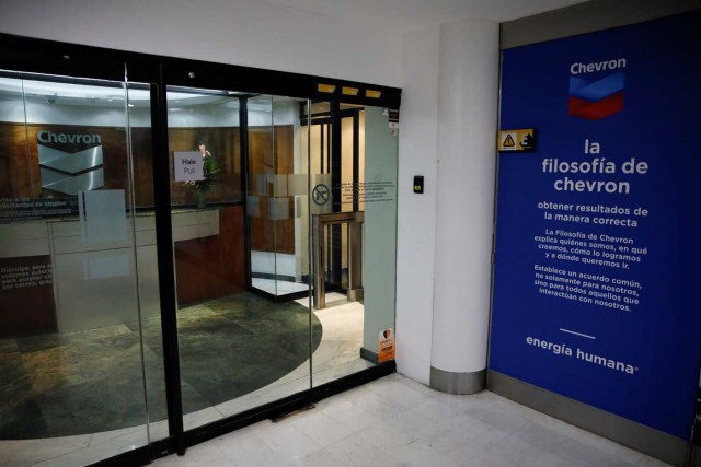 The logo of Chevron is seen in their office in Caracas, Venezuela April 18, 2018. REUTERS/Carlos Garcia Rawlins