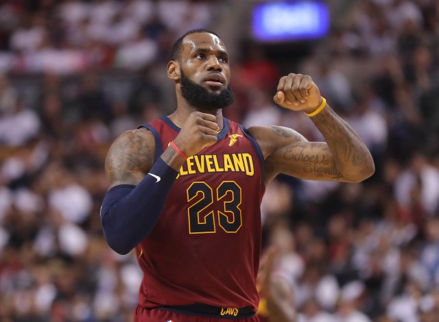 May 3, 2018; Toronto, Ontario, CAN; Cleveland Cavaliers forward LeBron James (23) celebrates after making a basket against the Toronto Raptors in game two of the second round of the 2018 NBA Playoffs at Air Canada Centre. The Cavaliers beat the Raptors 128-110. Mandatory Credit: Tom Szczerbowski-USA TODAY Sports