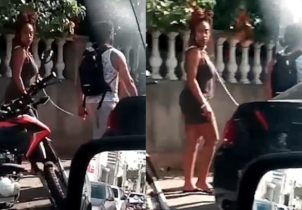 Este gringo sinvergüenza lleva a su novia por las calles de Colombia con un collar de perro (VIDEO)